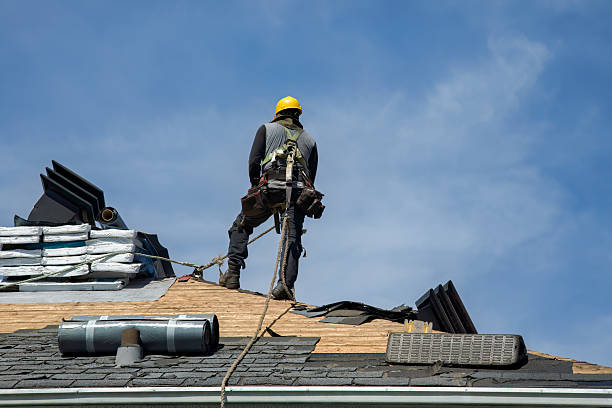 Professional Storm Damage Roof Repair technician working in Madras, OR
